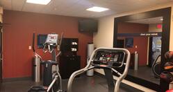 Fitness Center with Cross-Trainer and Treadmill