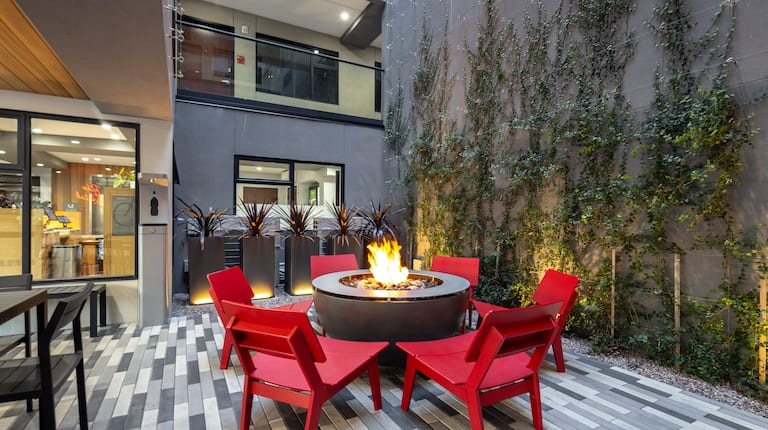 Patio area with firepit and chairs