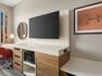 Convenient in-room work desk and large television for guests enjoyment