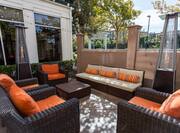 Tables, Lounge Seating, and Two Heaters on Patio
