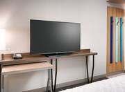 Guestroom with Work Desk and Television