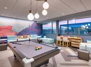 Game Room with Pool Table and Lounge Seating