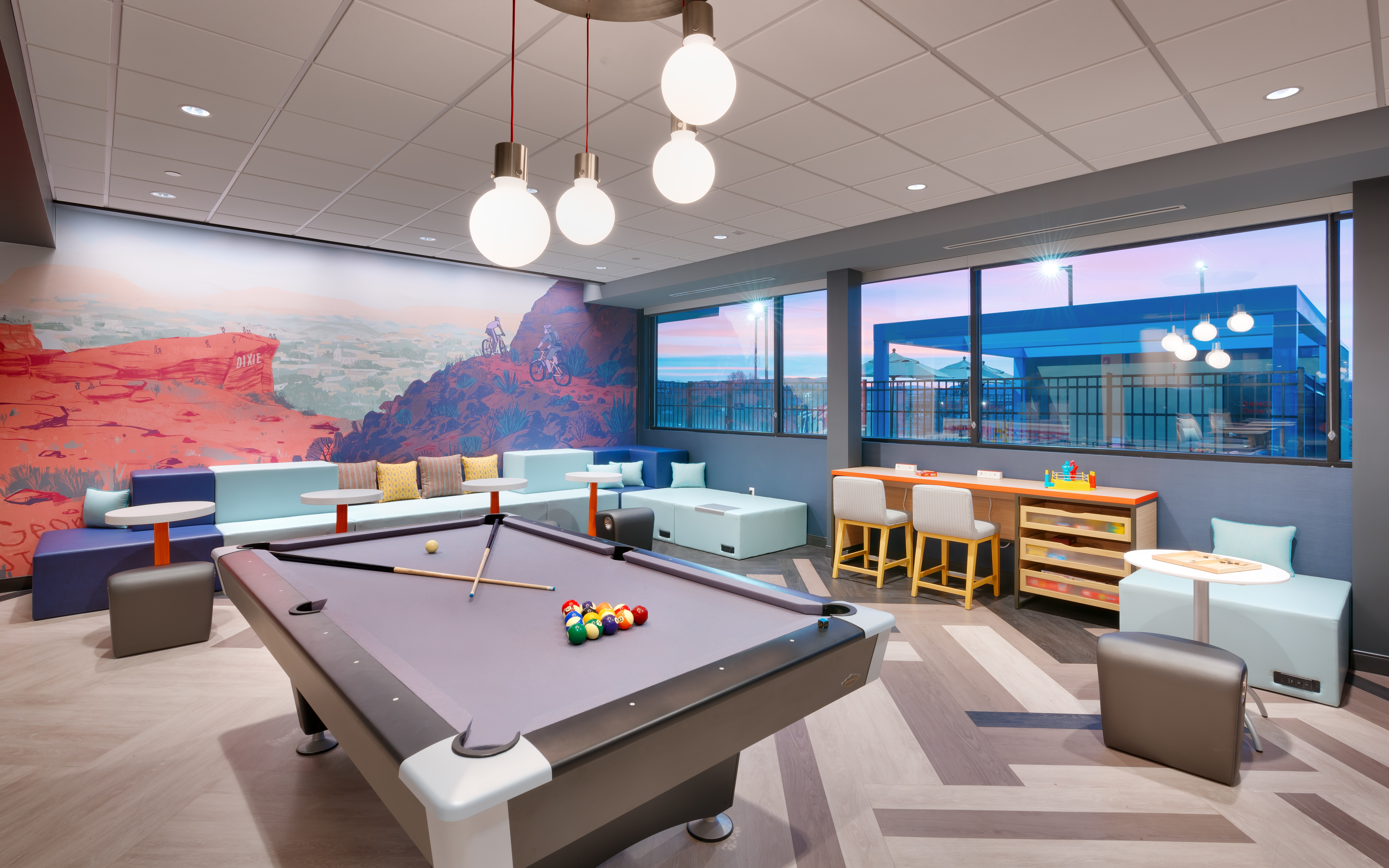 Game Room with Pool Table and Lounge Seating