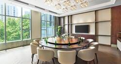 Executive Lounge Meeting Space with round table and chairs