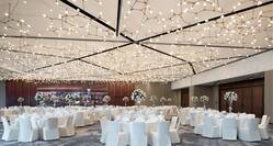 Grand ballroom with banquet dinner setup
