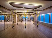 Fitness studio with mirrors and windows