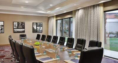 Meeting Room with Long Meeting Table and Office Chairs