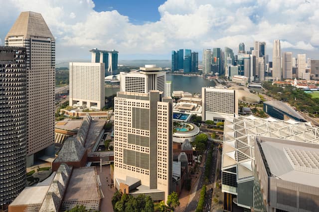 Conrad Singapore Marina Bay hotel exterior, surrounding buildings, view of the bay