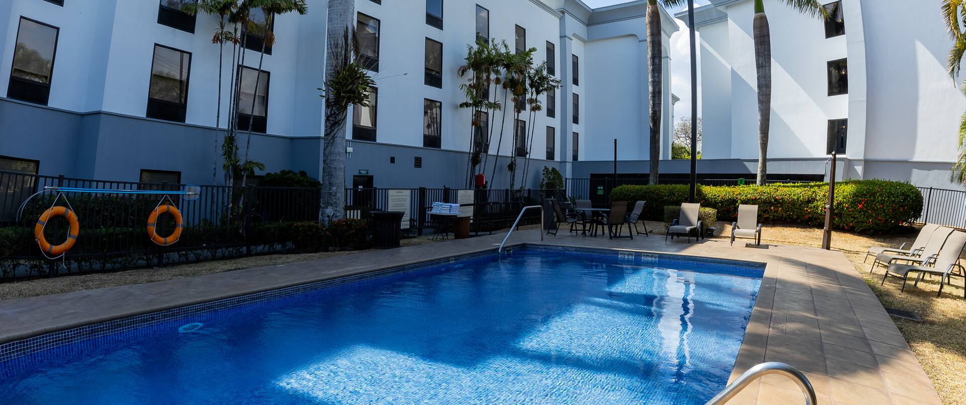 Hotel Exterior and Outdoor Pool Area