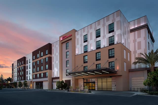 Exterior of hotel building at dusk