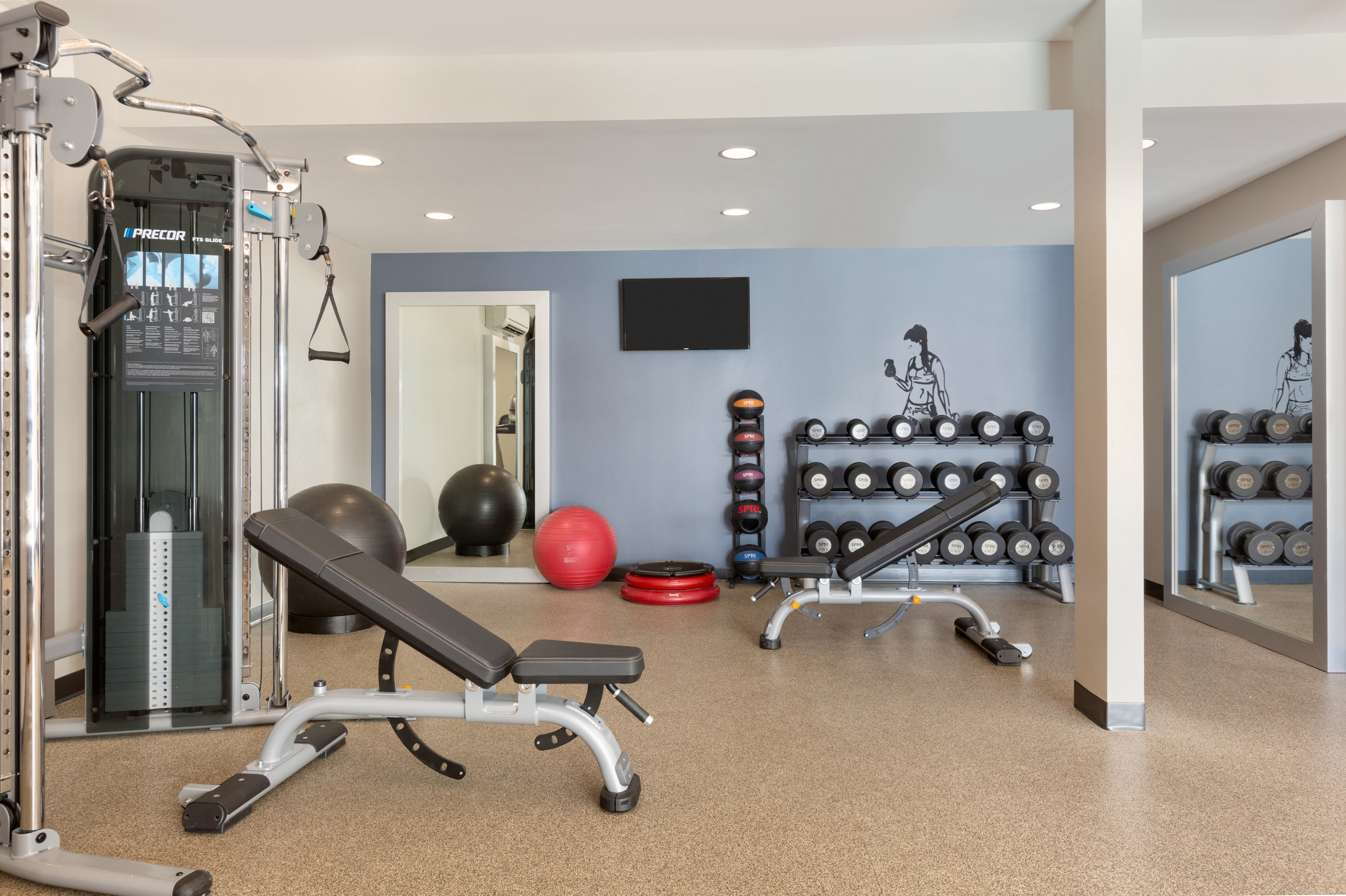 Fitness Center with Weights Treadmills and Exercise Bikes