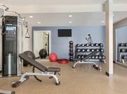 Fitness Center with Weights Treadmills and Exercise Bikes