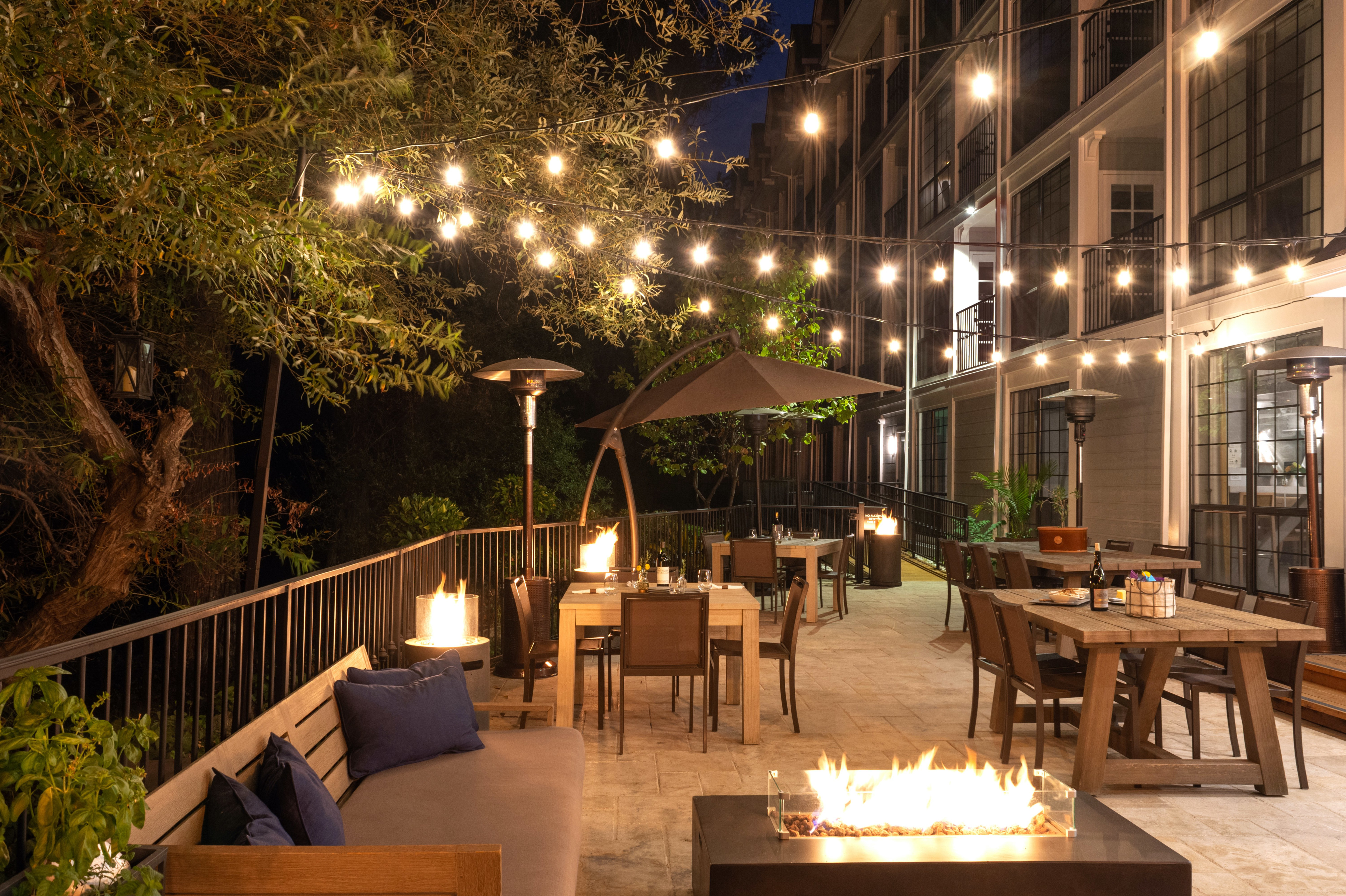 Outdoor Bar Patio at Night with Fire Pit