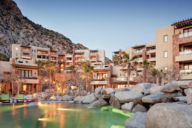 Exterior shot of Waldorf Astoria Los Cabos Pedregal with pool in foreground.