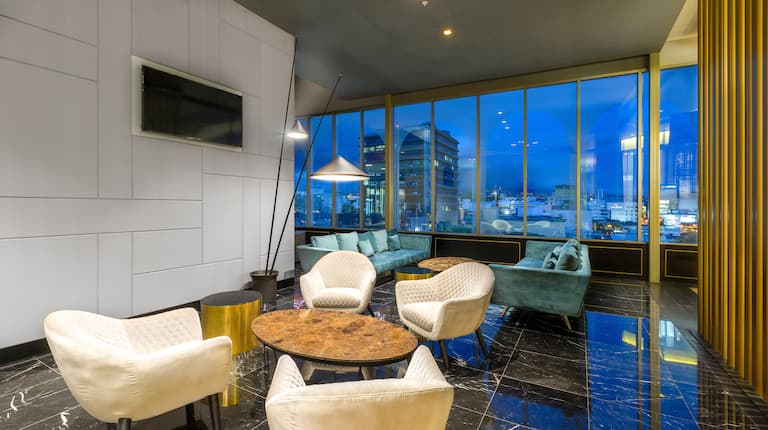 Lobby Sitting Area with ;Floor to Ceiling Windows