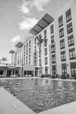 Hilton Garden Inn Building and Outdoor Pool Area