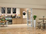 Convenient on-site coffee shop featuring beverages and grab and go food.