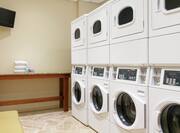 Convenient on-site coin operated guest laundry facilities.