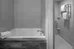Apartament cu baie cu cadă