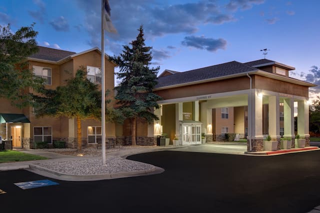 exterior view of hotel at dusk