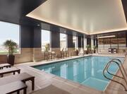 Relaxing Indoor Pool with Seating Area