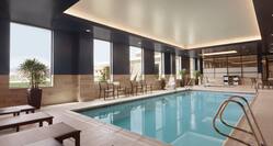 Relaxing Indoor Pool with Seating Area