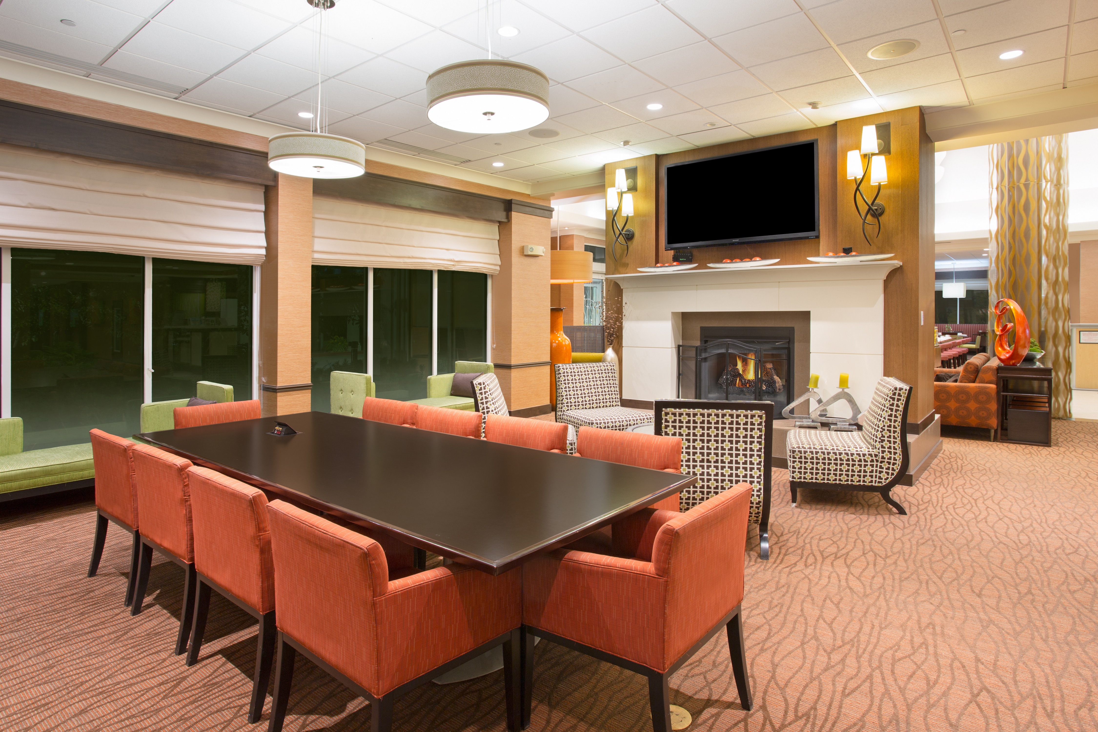Table, Seating and Fireplace in Lobby