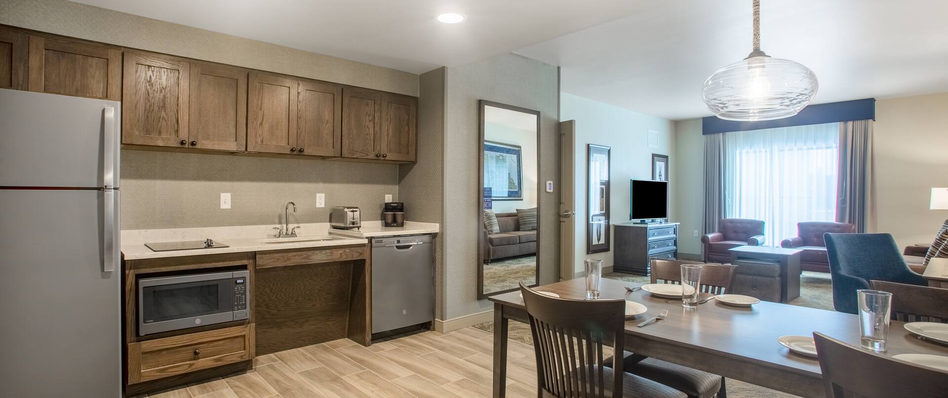 Suite Living Area with kitchen and dining table