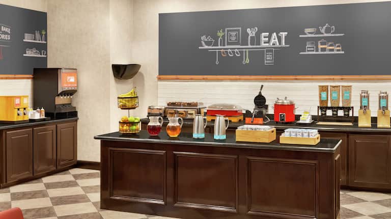 Complimentary daily breakfast buffet overflowing with delicious food and beverages.