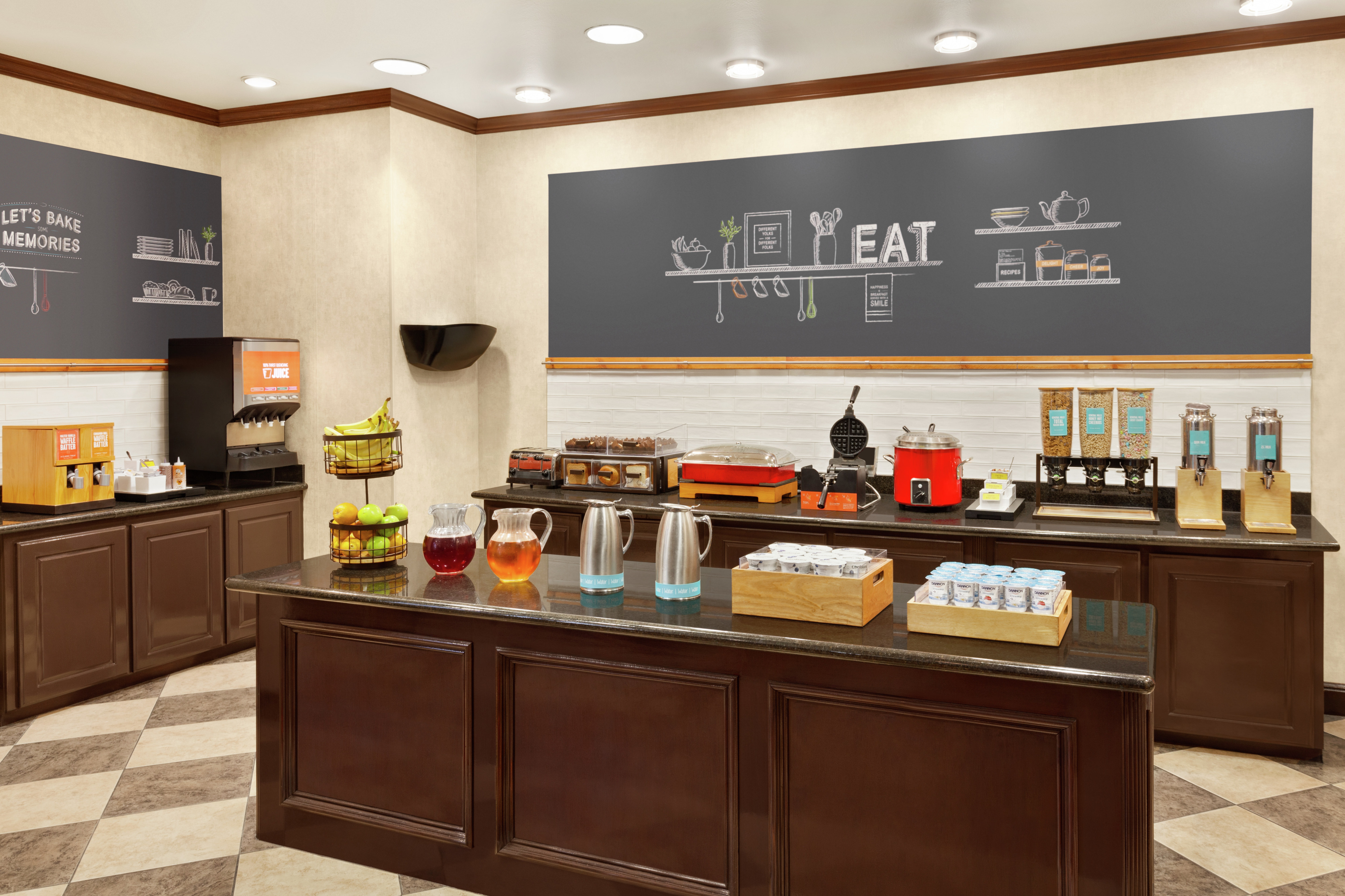 Complimentary daily breakfast buffet overflowing with delicious food and beverages.