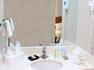 Guest Room Suite Bathroom with Vanity and Amenities 