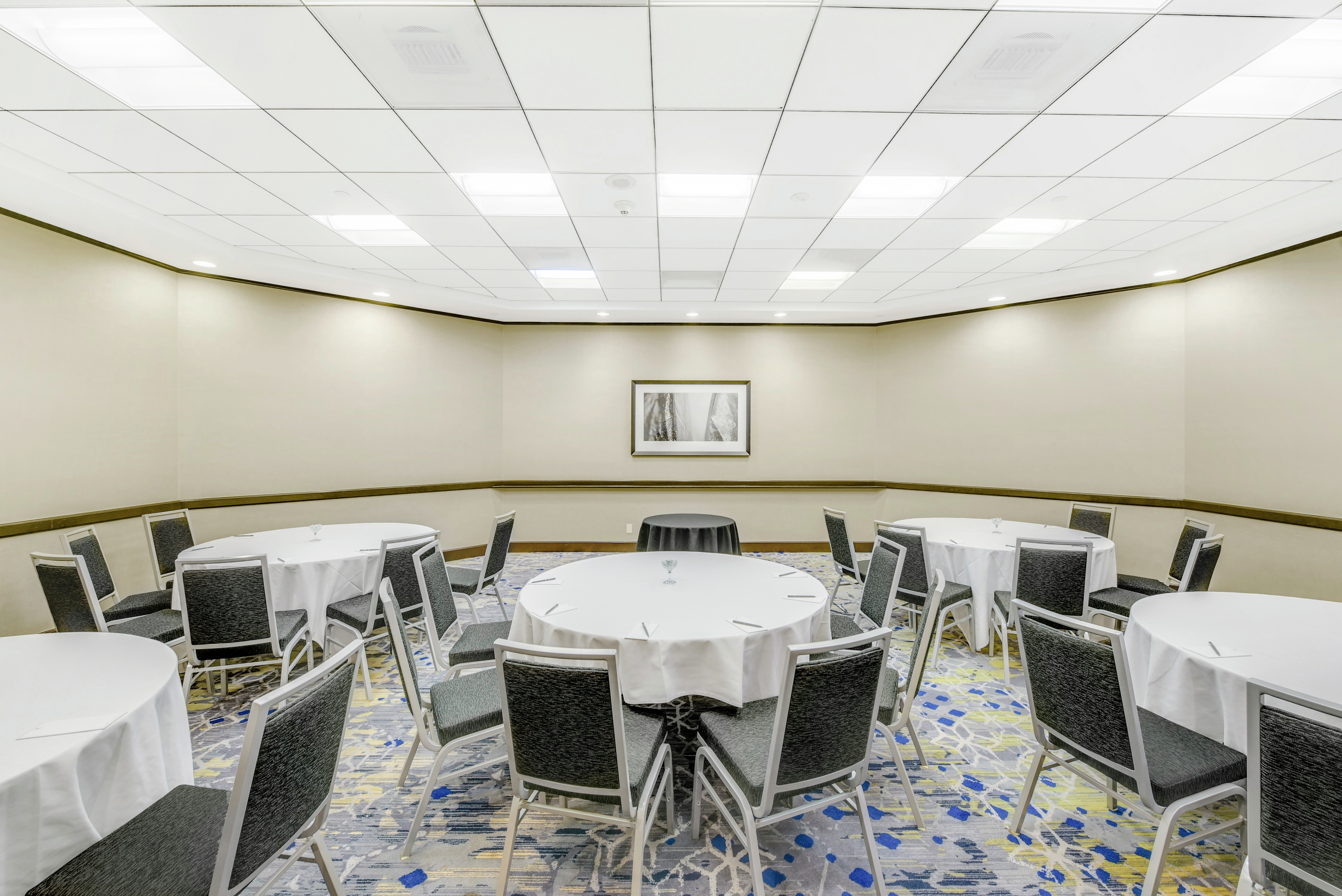 Meeting Room with Round Tables and Chairs