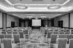 DoubleTree Hotel Meeting Room with Projector Screen and Chairs