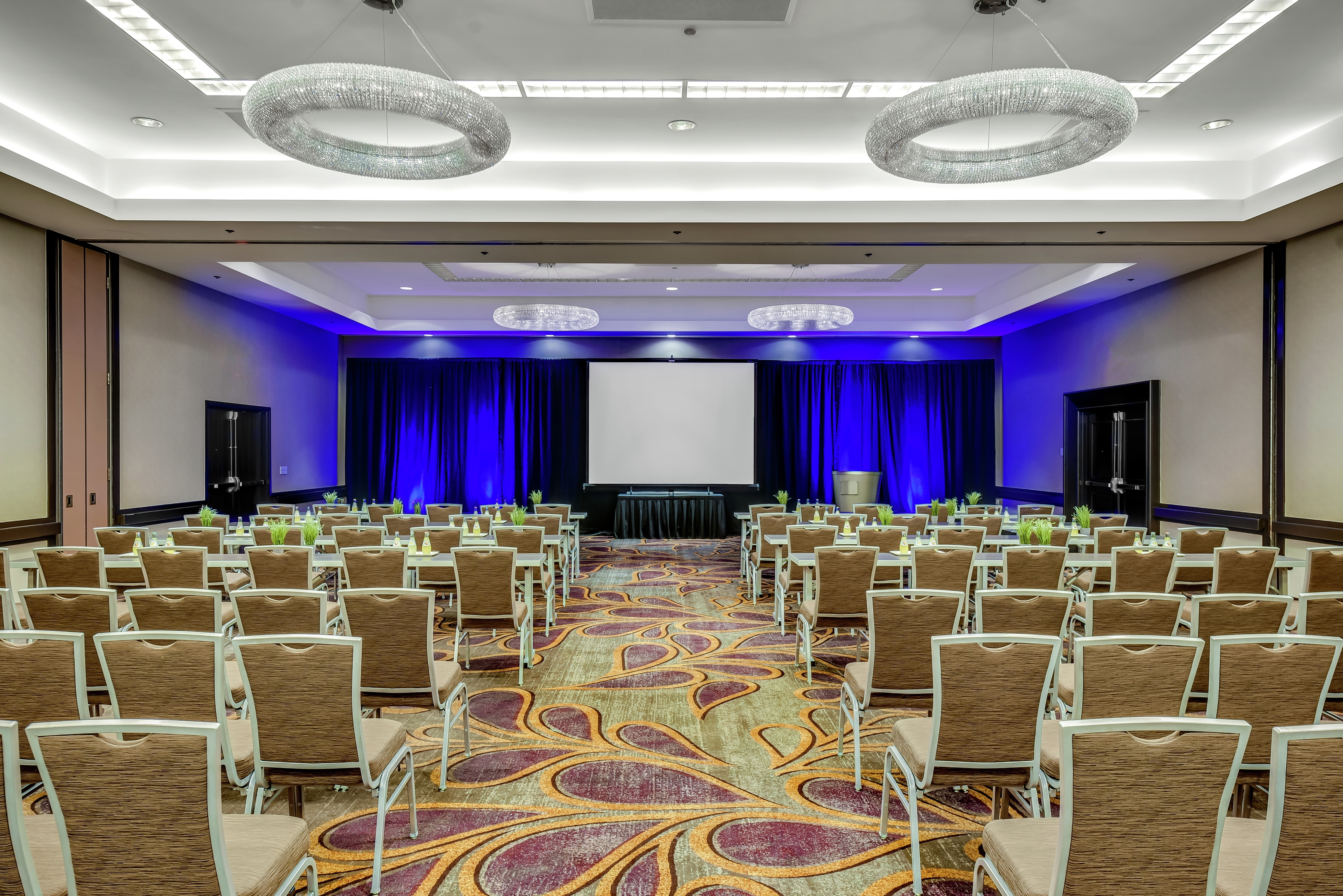 DoubleTree Hotel Meeting Room with Projector Screen and Chairs