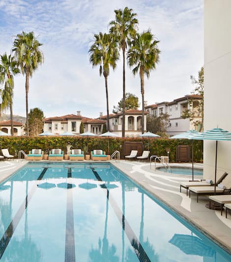 Pool and sun loungers at Waldorf Astoria Monarch Beach