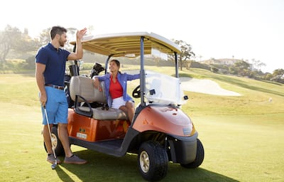 Couple With Golf Cart