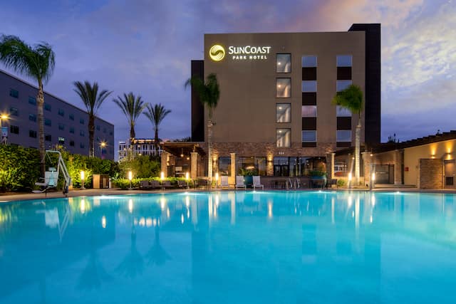 Outdoor pool and hotel exterior