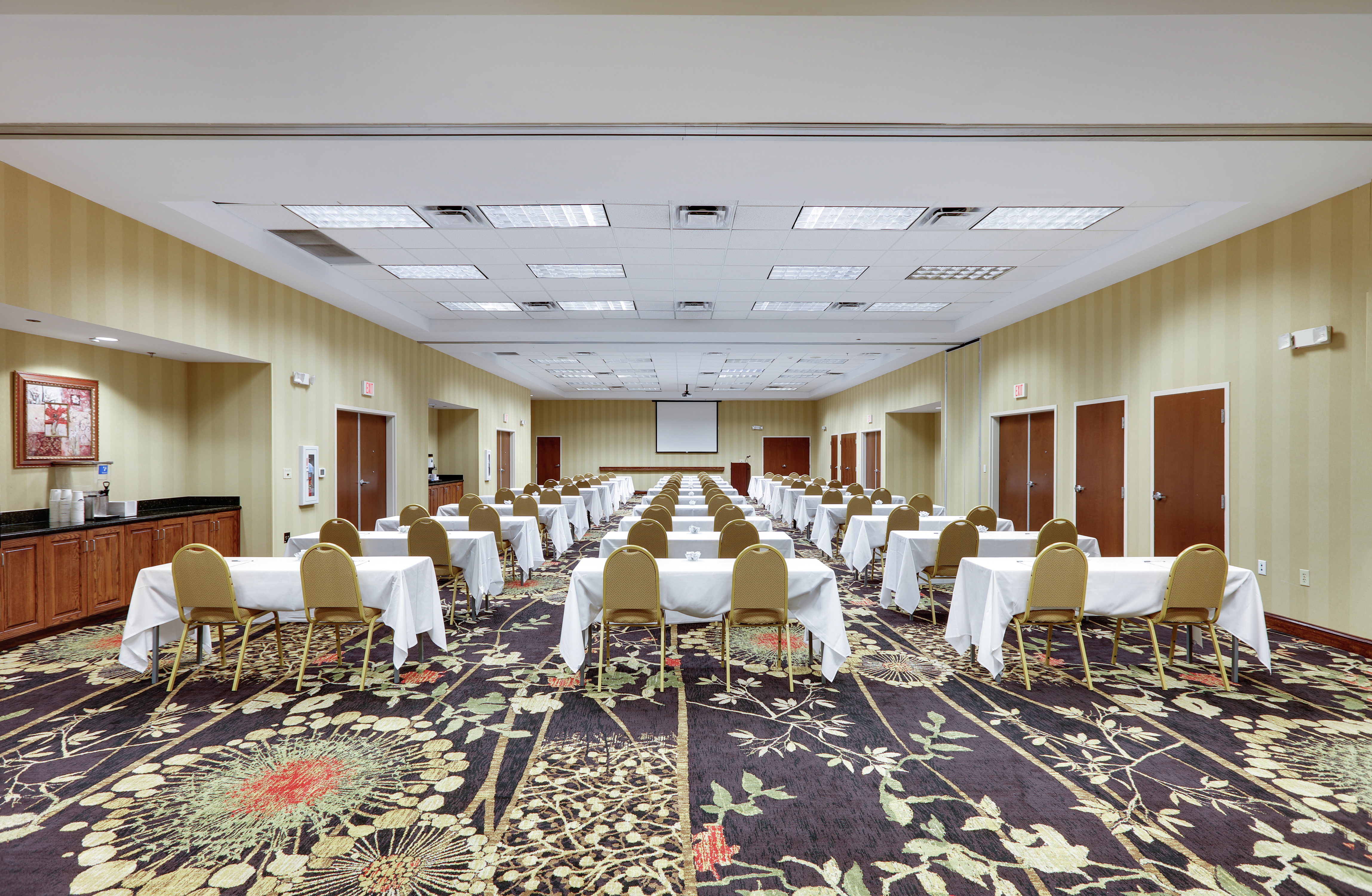 Large Meeting Room With Tables And Seating 