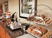 Continental Breakfast Display With Waffles Toast And Bagels