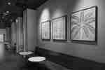 Coffee cafe walls lined with modern artwork