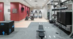 Hand weights and cardio equipment available in our fitness center