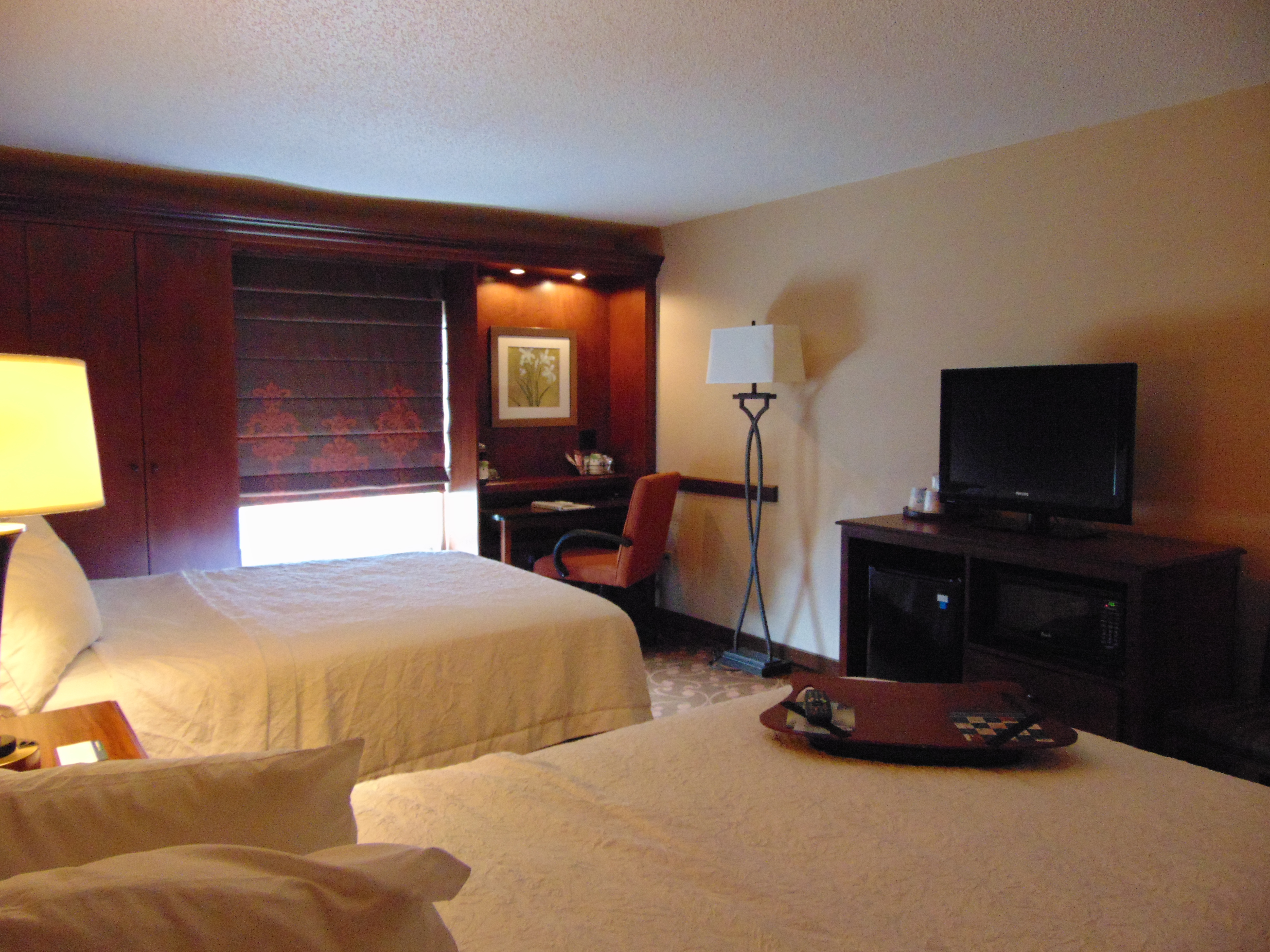 Guest Room with Two Queen Beds, Television and Work Desk 
