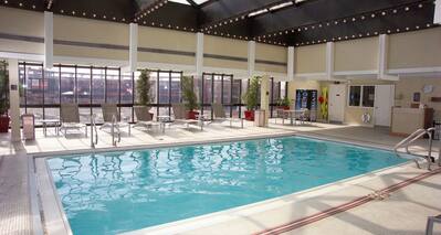 Indoor Pool with Seating Area