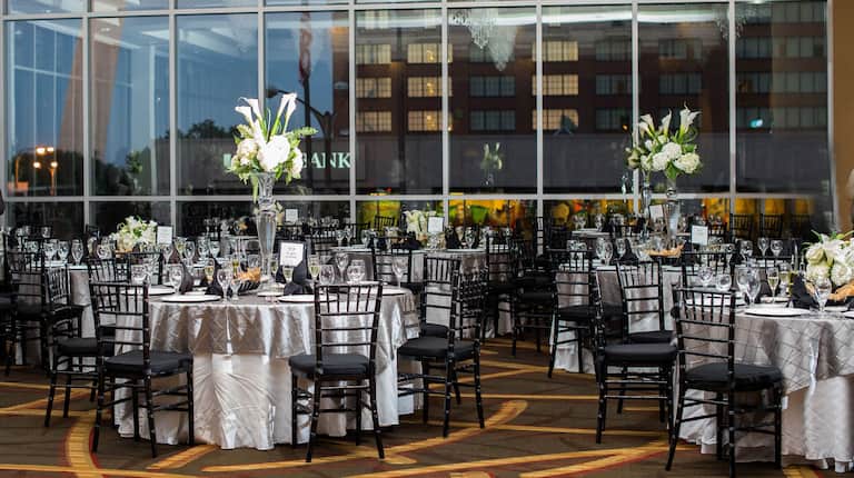 Event space set up  with round tables and chairs