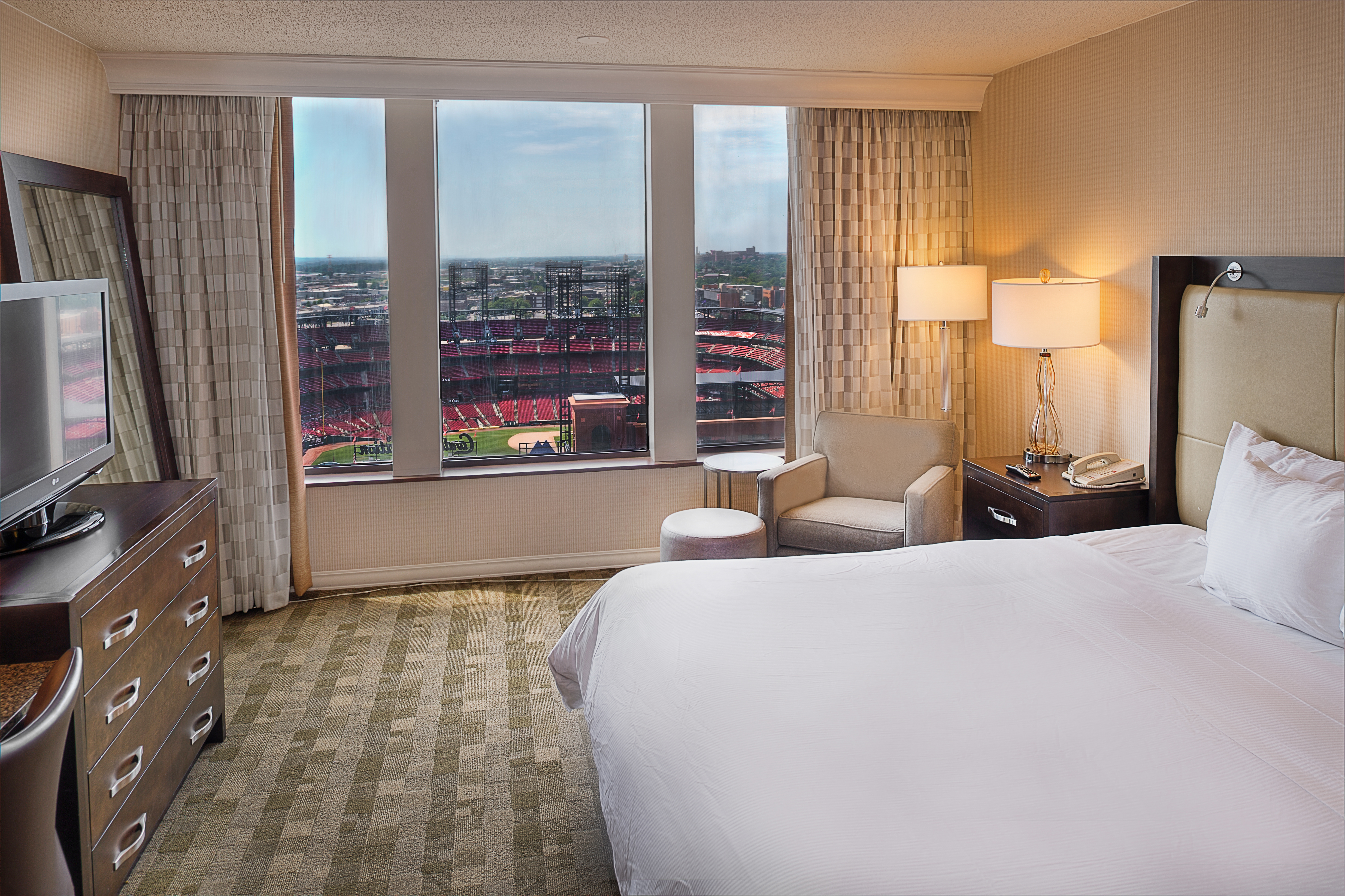 Room with King sized Bed Offering View of Busch Stadium