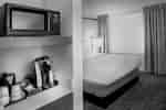 King Bed Junior Suite Guest Room With Coffee Machine And Microwave