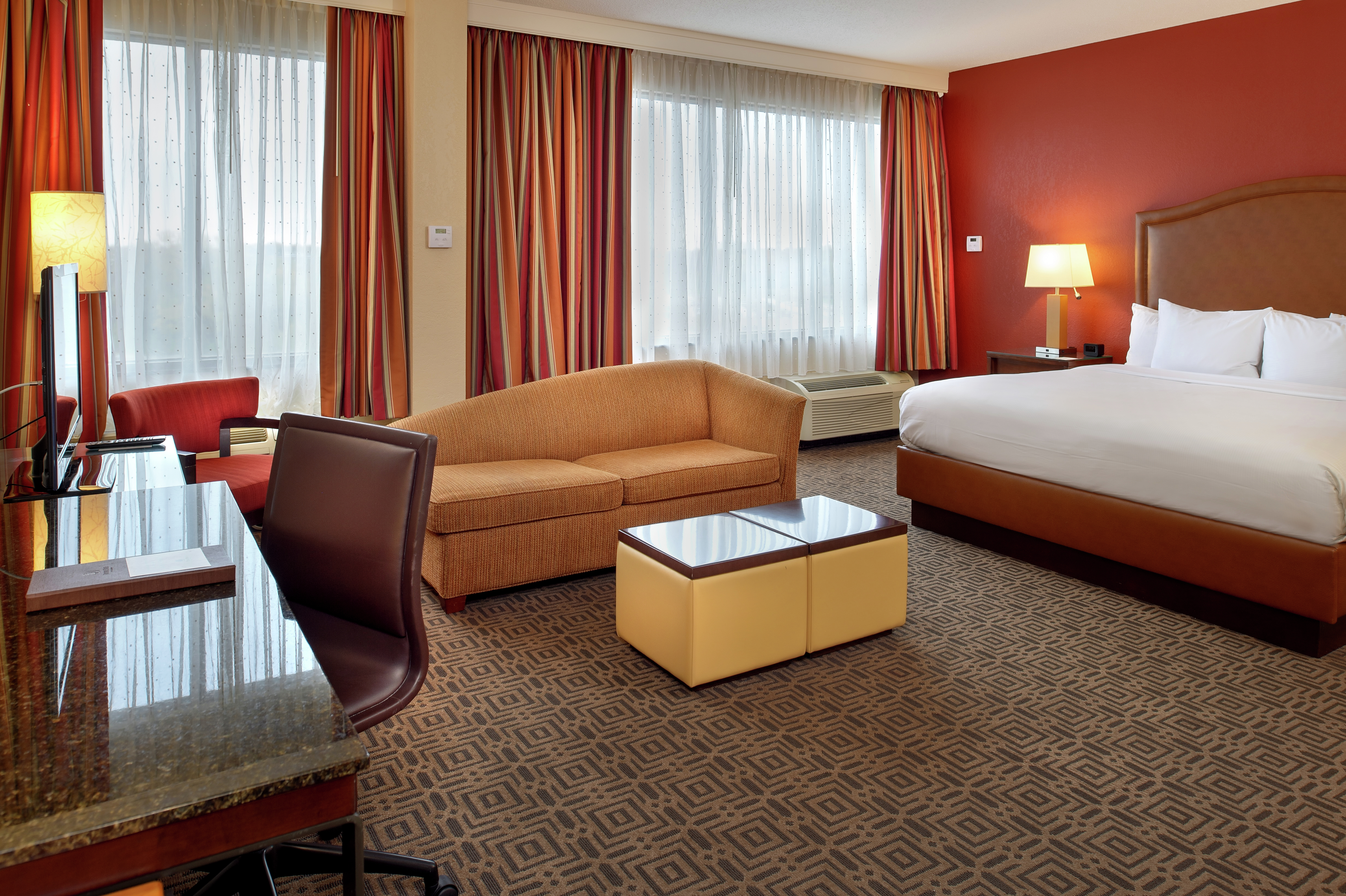 King Junior Suite with Bed, Lounge Area, Work Desk, and Room Technology