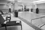 Indoor pool with loungers and towels