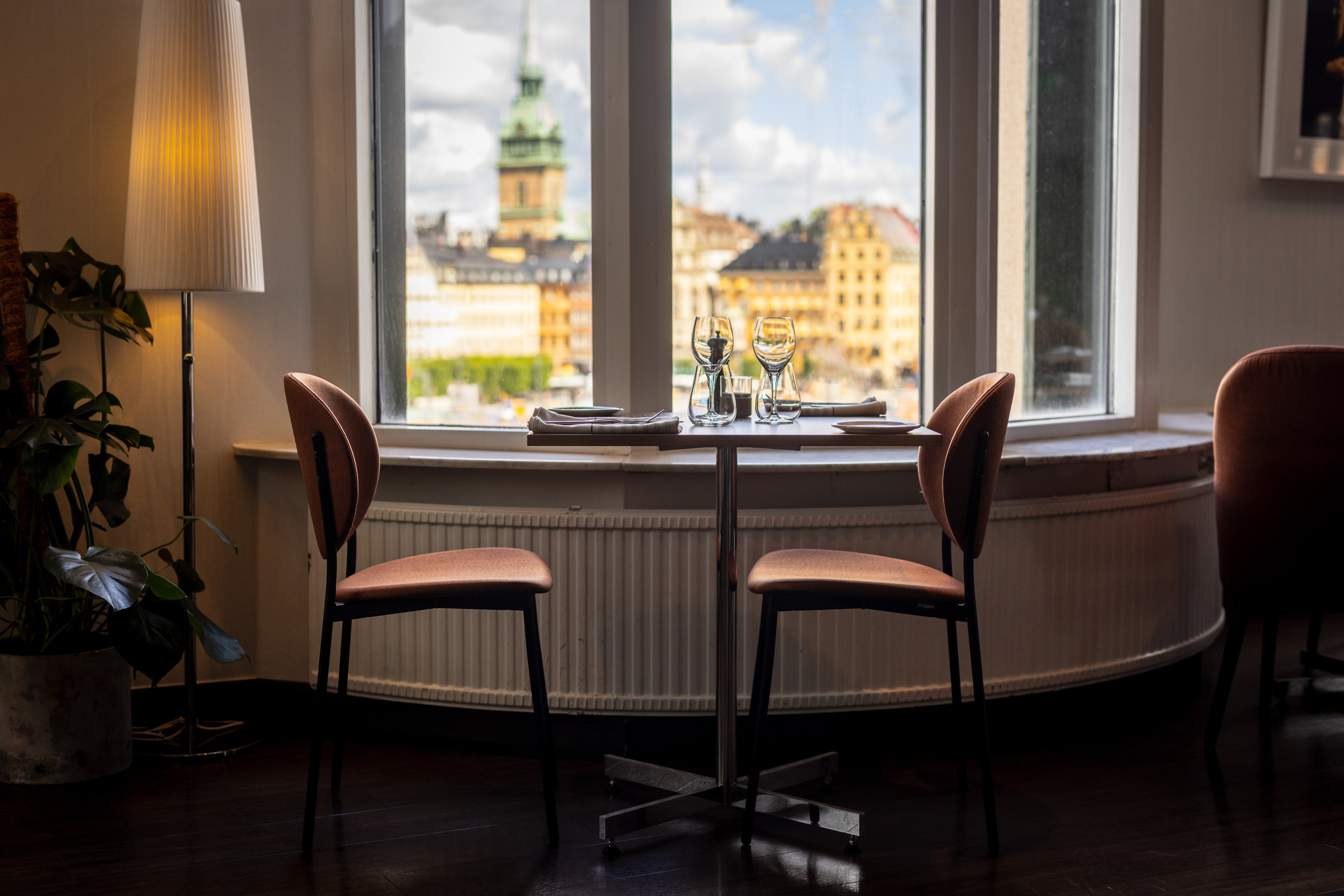 Table Set for Dining at a Restaurant with City View