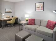 Suite Lounge Area With Work Desk
